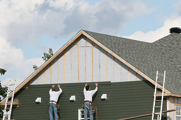Professional Siding technician working in Fletcher, OH